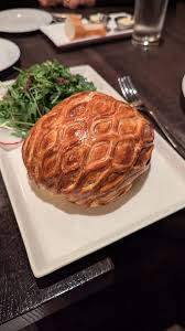 Orsay signature dishes Beef Wellington, Mussels Frites, Onion Soup Gratinée, Duck Breast, Bouillabaisse